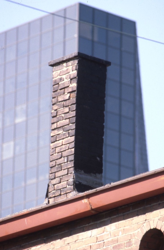 Concrete chimney crown at the top of the stack — Chimney Waterproofing in Pompano Beach, FL