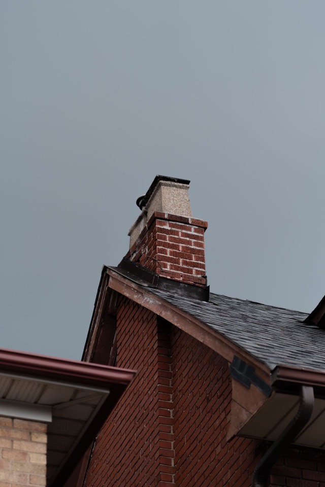 Step flashing where the chimney meets the roof — Chimney Waterproofing in Pompano Beach, FL