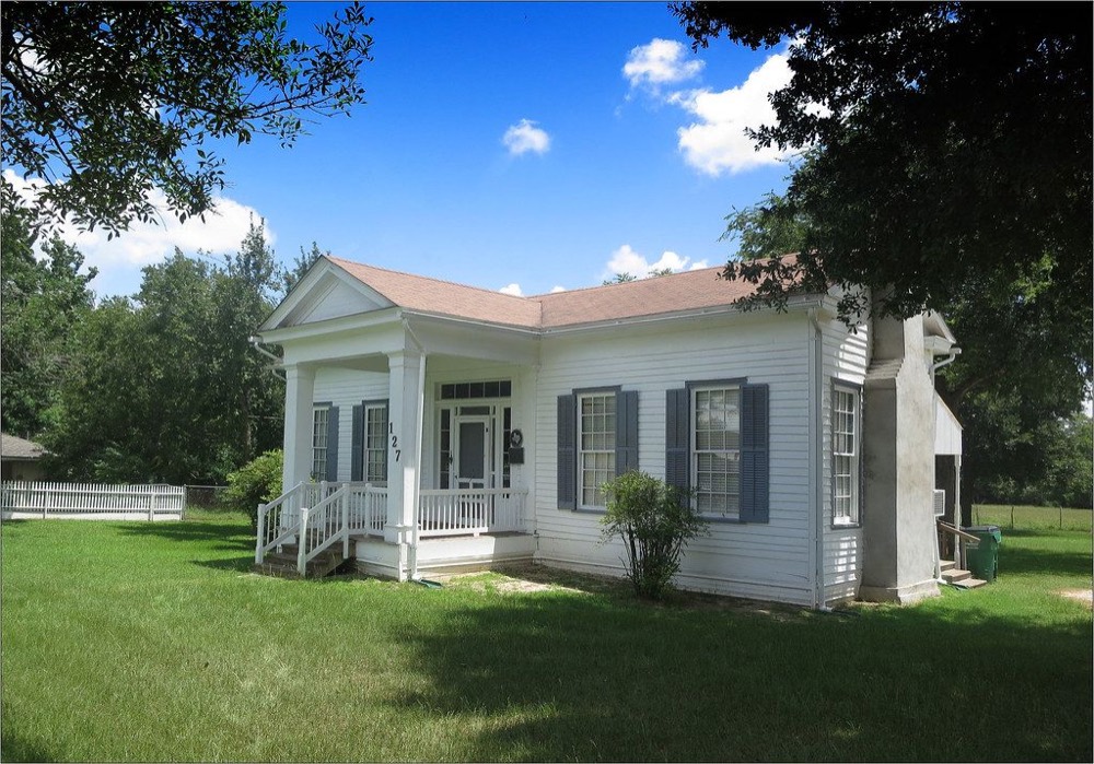 Residential street-side view with chimney stack — Your Local Team in Cresthaven · Broward County